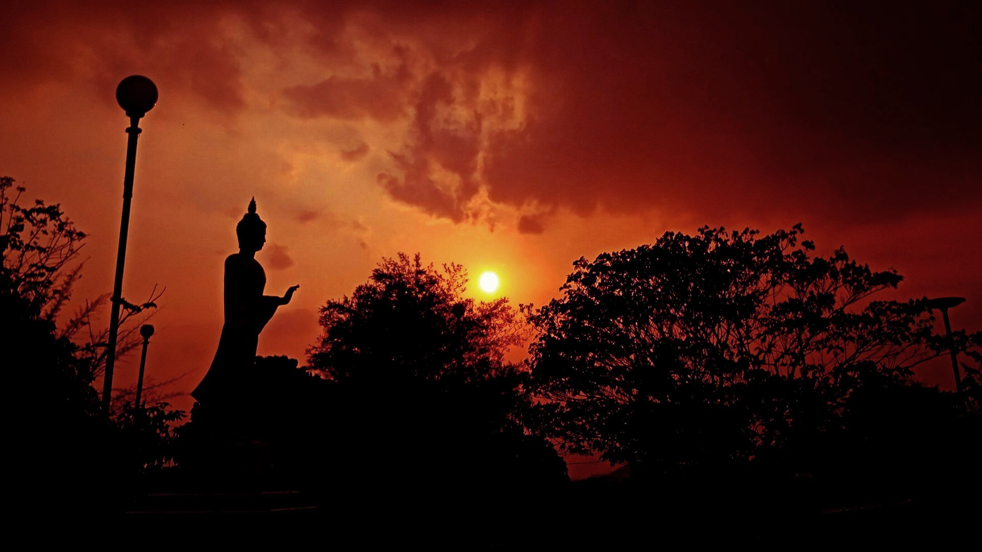 The Buddha at a sunset 1