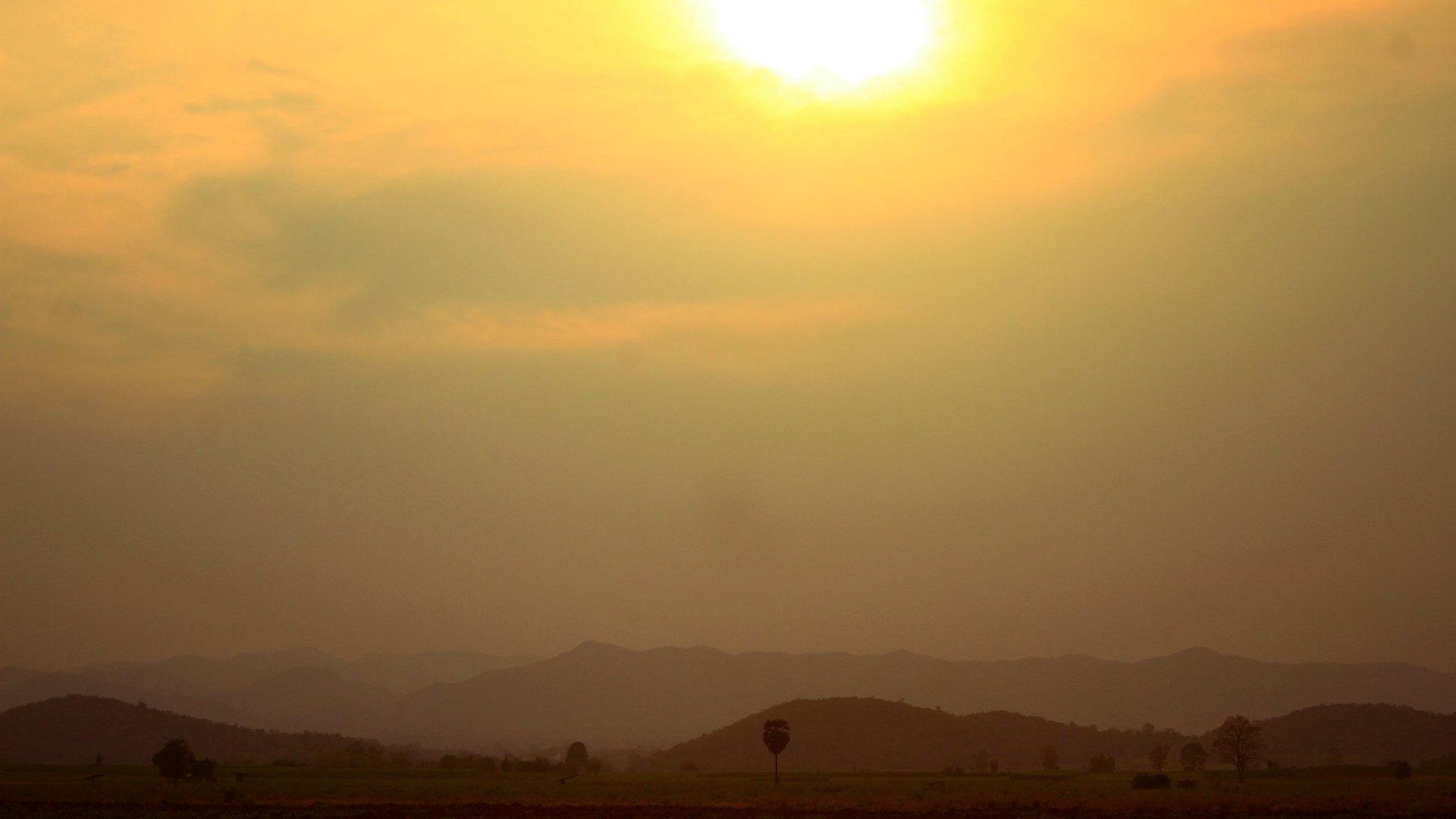 A mountain range at a sunset